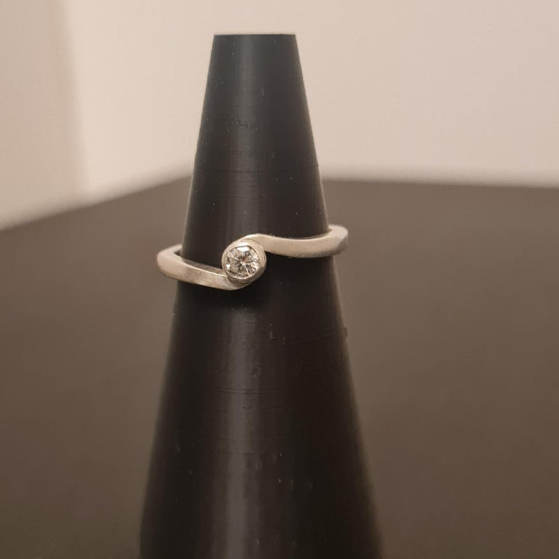 sterling silver swirl ring with moissanite stone