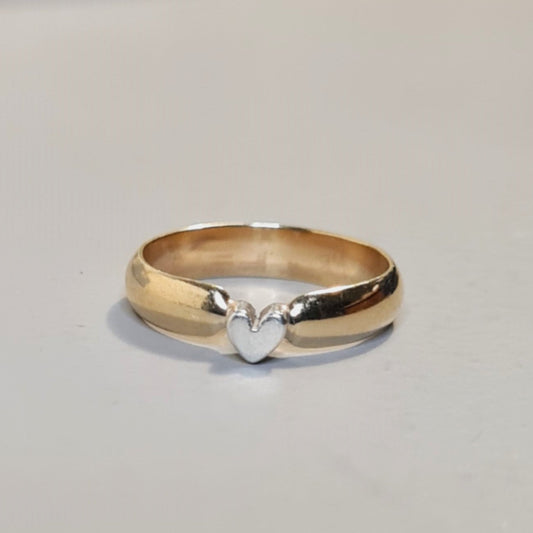 Gold ring with sterling silver heart 