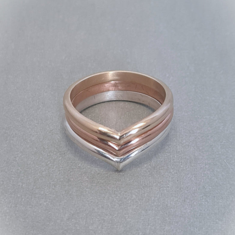 Handmade wishbone stacking ring in 9ct gold, 9ct rose gold and sterling silver