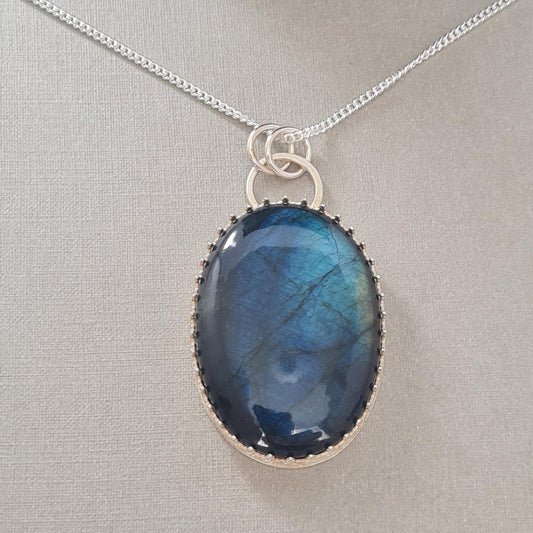 Labradorite bezel pendant on silver chain