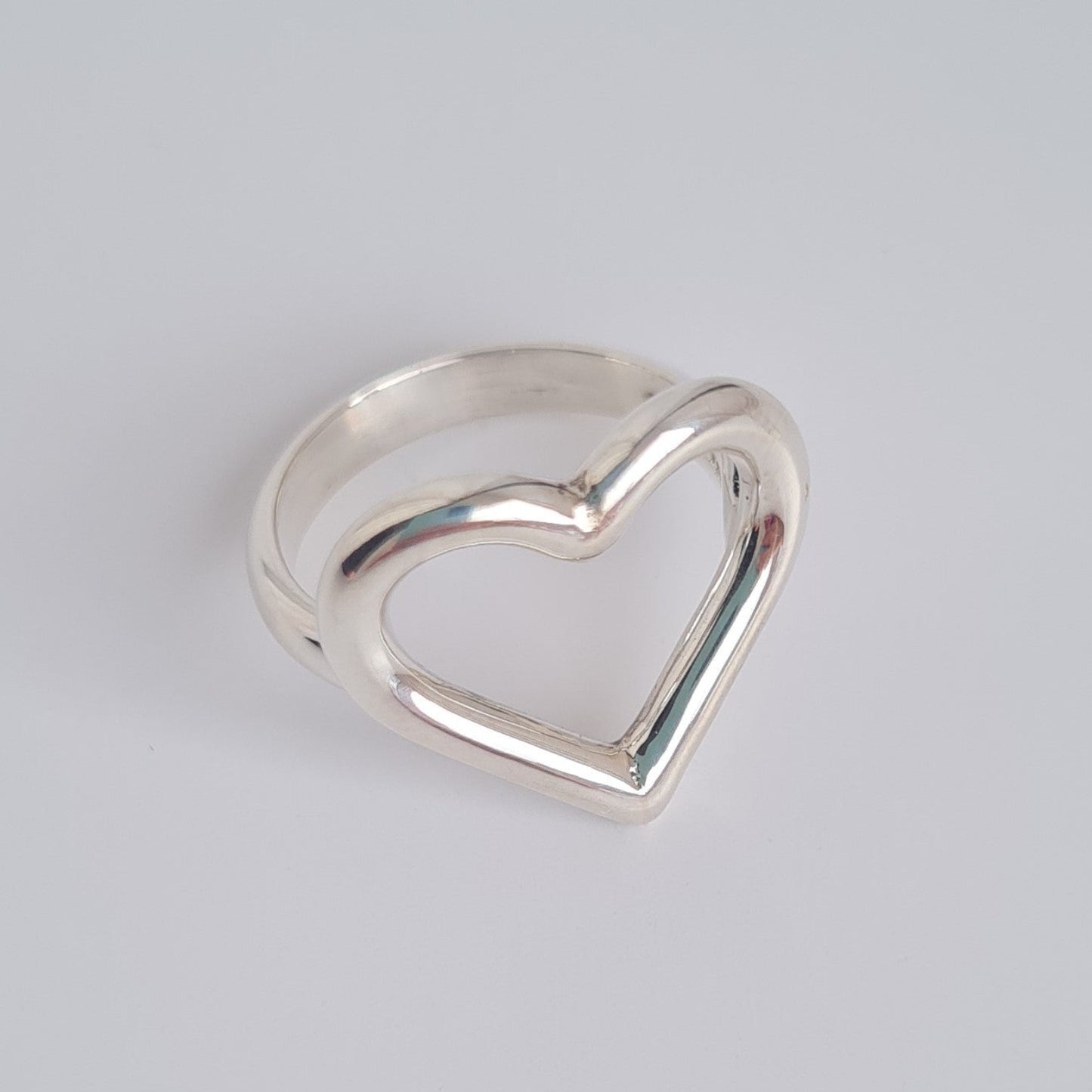 silver open heart ring on d-shaped band