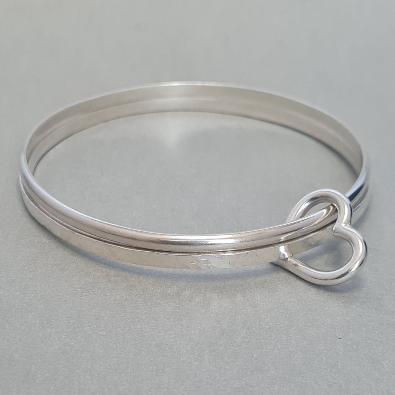 sterling silver stacking bangles with silver heart charm, handmade