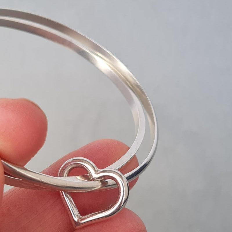sterling silver stacking bangles with silver heart charm